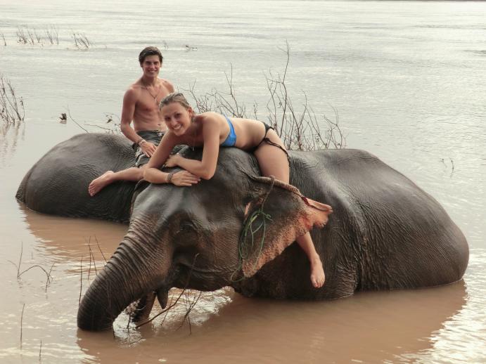 nude woman riding elephant