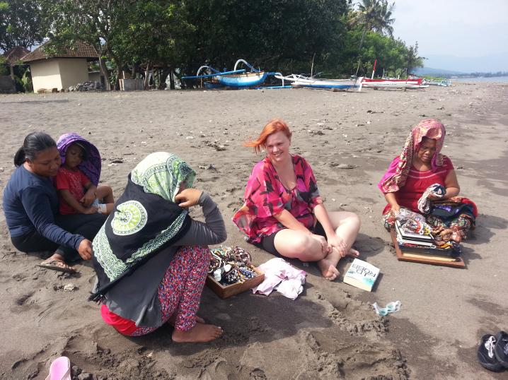 The women have a little chat on the beach 